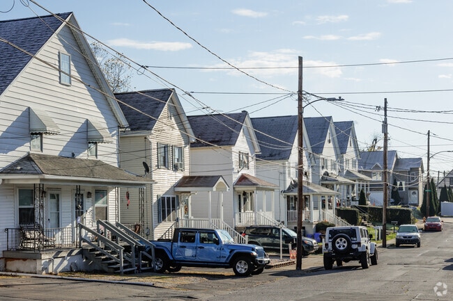 A street with minimal traditional homes in West Mountain, PA.