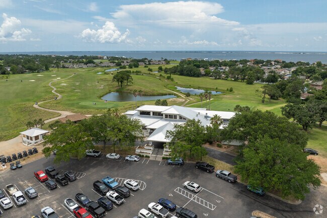 The Tiger Point Golf Club offers an 18-hole layout and winds through Midway Santa Rosa.