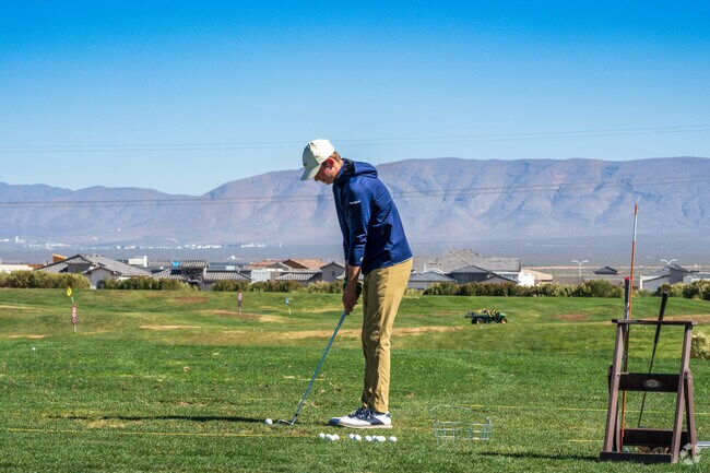 Homestead Acres residents enjoy many outdoor amenities including Red Hawk Golf Club nearby.