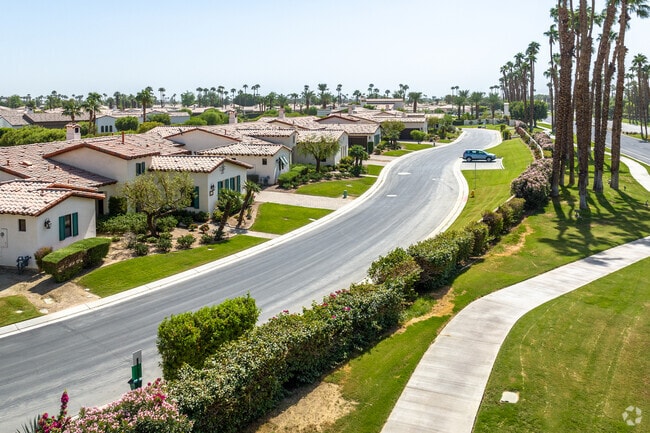 Spanish-style homes grace the landscape of a private community within PGA West.
