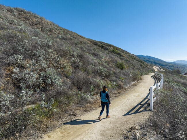 Miles of trails and mountain views are nearby at Natural Parkland Trail Head in East Highlands.