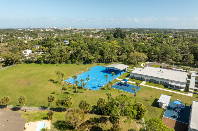 Melaleuca elementary has a large green space and playground for the students.