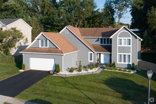 Owings Mills, MD has many styles of multifamily houses in the neighborhood with parking.