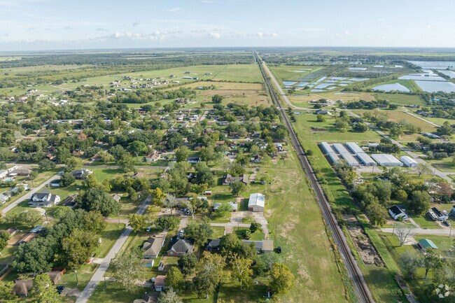 Danbury, Texas is dotted with large plots of land, with a railway that runs through town.