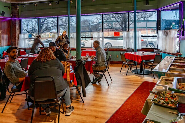 Customers enjoy lunch at Coriander Bistro, an Indian restaurant in downtown Sharon.