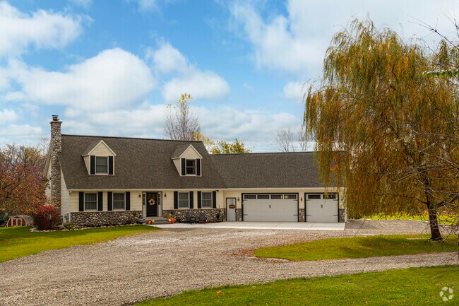 Many Northfield Township homes are grand versions of traditional styles like this Cape Cod.