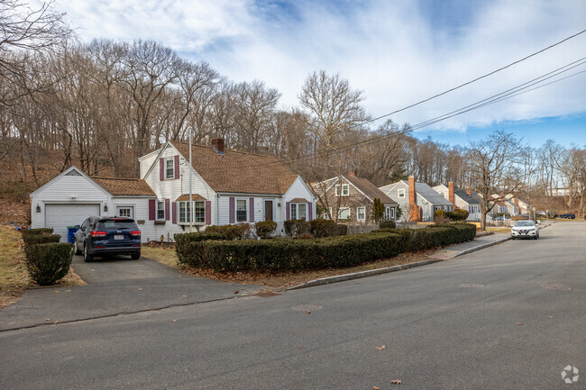 Beautiful shrubbery surround the homes of Weymouth Landing.