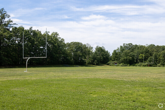 Highland-Goffes Falls School in Bedford has a football field.