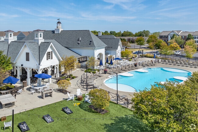 LC Dublin apartment community features a pool and a cornhole field.