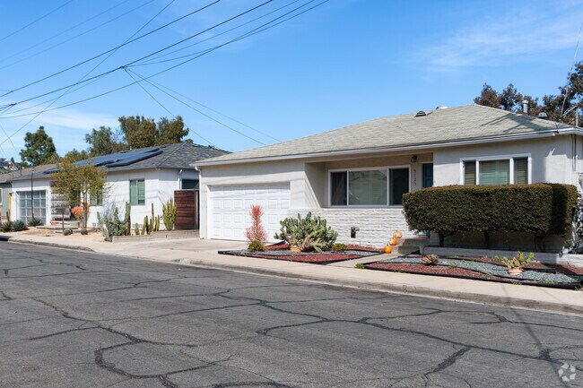 College East features charming ranch-style homes with spacious yards and timeless appeal.