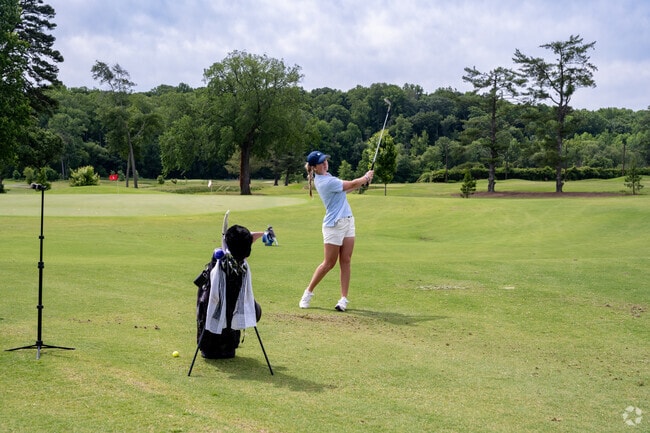 Collegiate golfers work on their game at Maple Chase Golf Club in Ogburn Station.