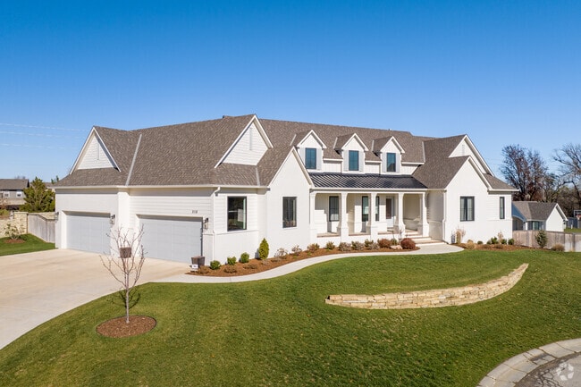 This Northeast Wichita home has a gorgeous front yard.