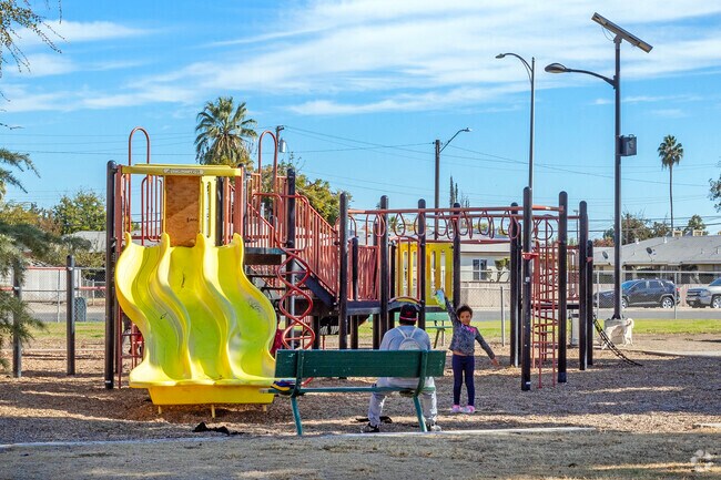 Radio Park has a playground and wide open space for activities in Fresno.