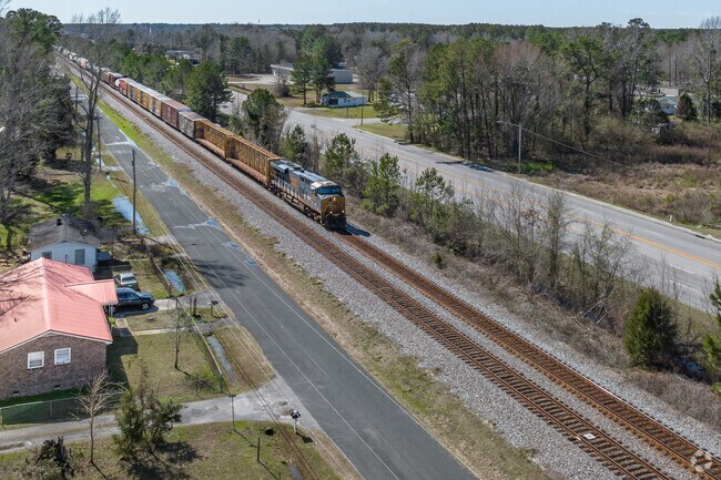 Enjoy the subtle sounds of the train that runs through downtown St. Stephen.