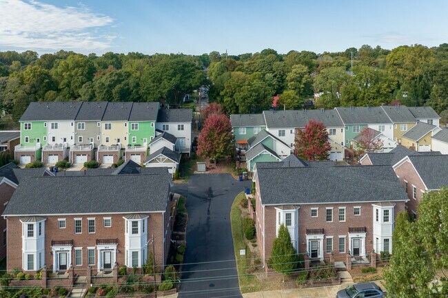 Recent additions to South Marshall, NC include these painted lady townhomes.