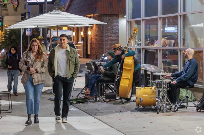 Strolling to the next destination on First Friday in Bixby Knolls.