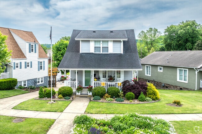 Many homes in Westmoreland feature manicured yards, inviting porches, and classic Americana curb appeal.