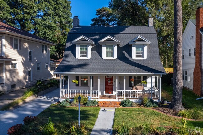 Newly installed windows on a renovated 1920s Cape Cod home are a charming sight in Irvingdale.