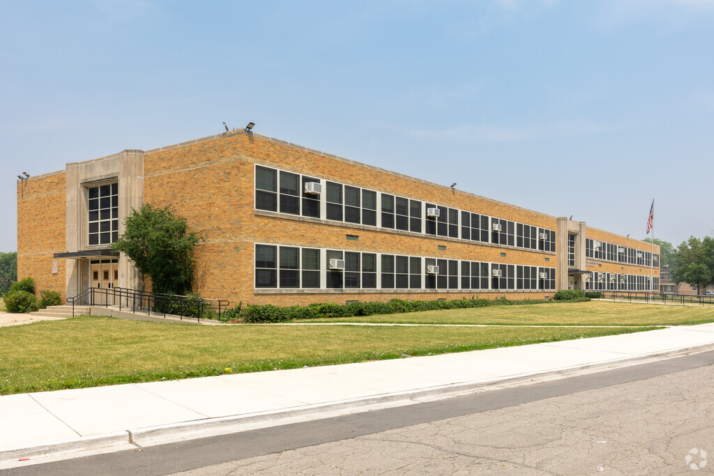 Turner-Drew Language Academy, main building with open green grass space, Chicago, IL.