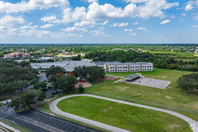 Sunshine Elementary School has athletic courts and playgrounds at the side of the property.