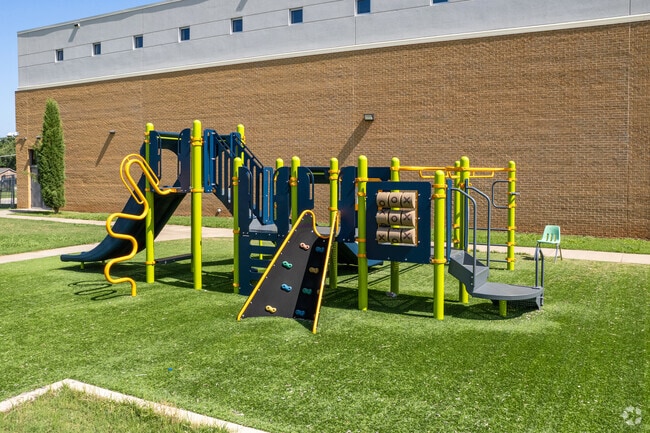 The playground at Esperanza Elementary School has a climbing wall, slide, and much more.