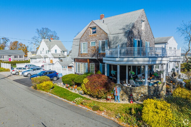 Homes in Conimicut-Shawomet often make the most of small yards with beautiful native plant gardens.
