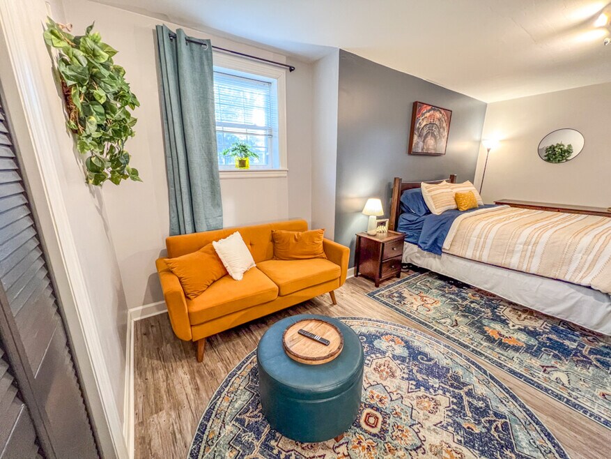 Furnished bedroom with apple tv, 55
