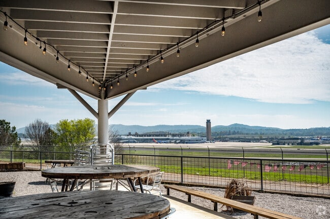 Outside Seating overlooking the Runway at Alpha Charlie Grill in Inglewood.
