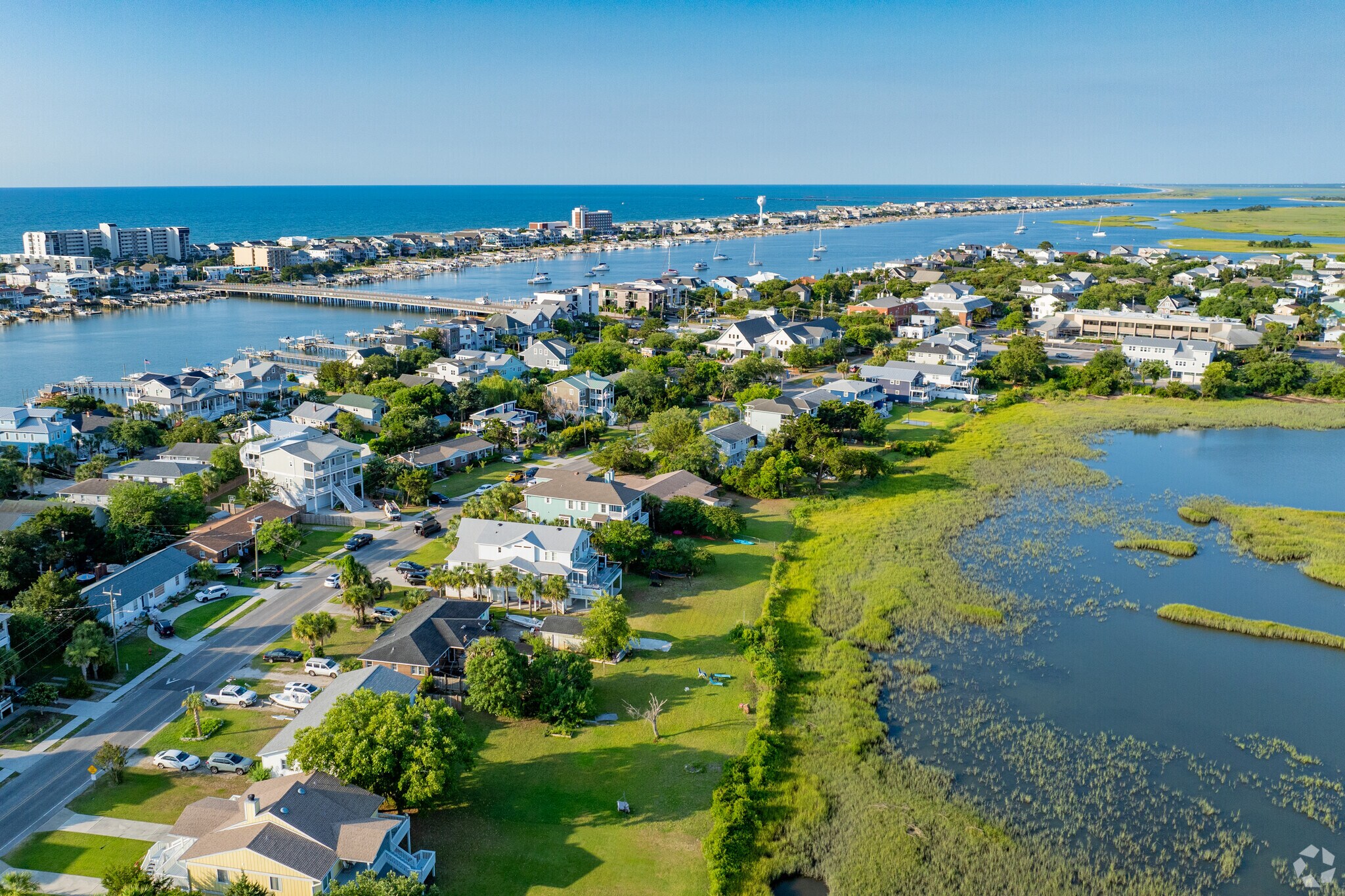 Azure skies meet blue waters in Airlie.