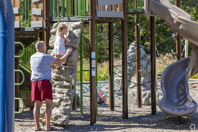 Howard Park in Chapel Ridge offers modern playground equipment for families with young children.