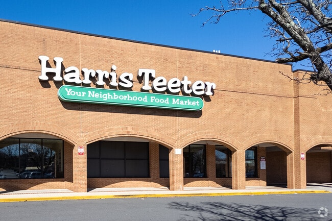 Market stalls brim with local produce and crafts, enticing shoppers in East Forest.