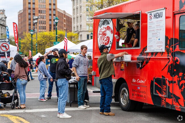 At the Syracuse Crawfish Festival, you can find many food trucks serving fresh food.