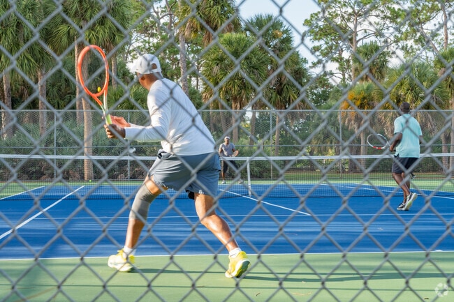 Tennis match at Haverhill Park near Lake Belvedere Estates.