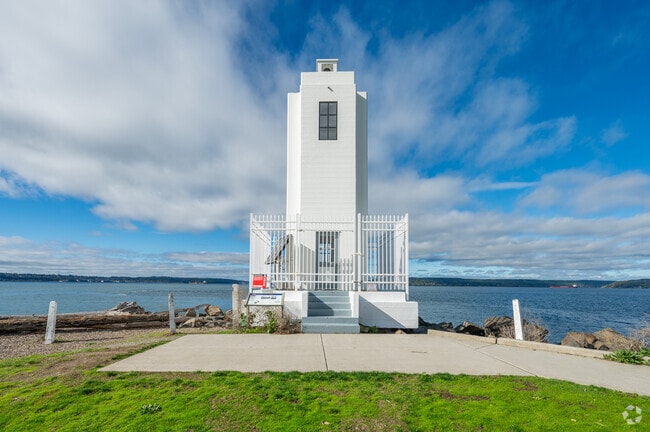 The historic Browns Point Lighthouse sits at the tip of Browns Point.