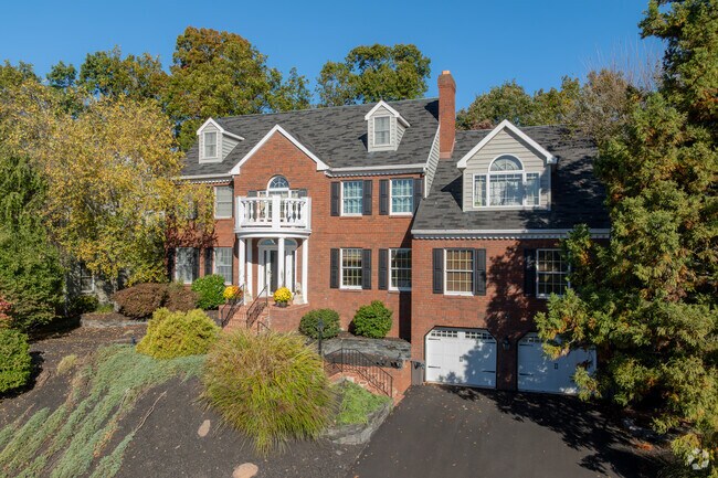 Swartzville features large colonial revival homes with manicured yards and mature trees.