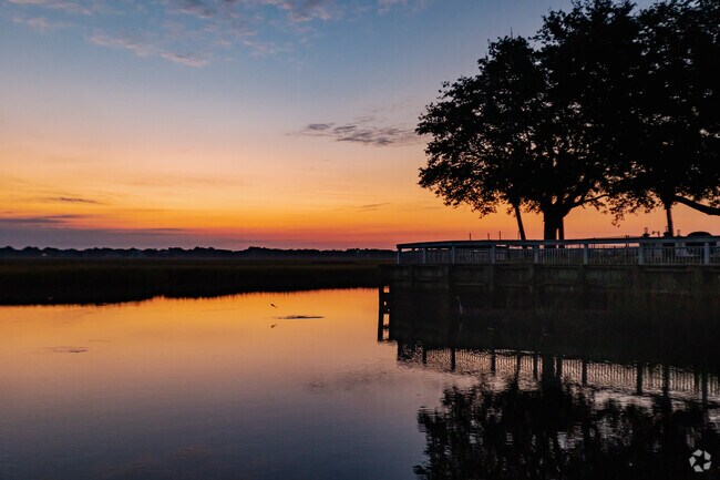 The best sunrises to catch by the marsh at DeBordieu Colony in Georgetown is on a beautiful hot and humid summer morning.