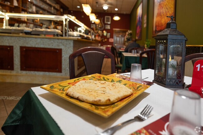 Clay Oven is a solid go-to for Indian in Coram, famous for its authentic Naan.