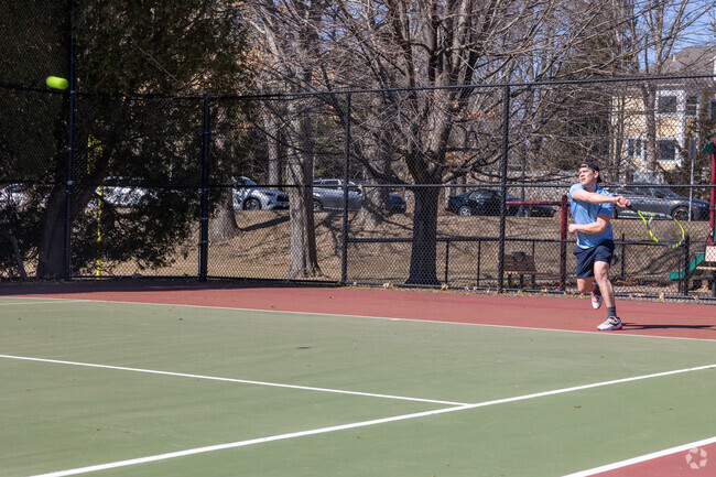Residents of Wellesley Square can head to nearby Hunnewell Field to practice tennis.