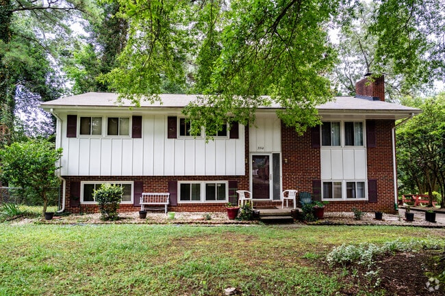 Large two story homes sit well back from the road leaving a large front yard in Atlantic.