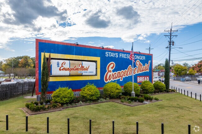 The Evangeline Maid Bakery sign in Mills is a testament to the neighborhood's rich history.