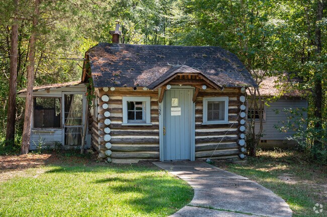 Visitors to Leigh Farm Park in Patterson Place can spot historic log cabins.