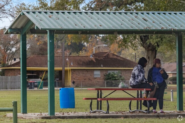 Residents of River Oaks love eating and conversing under one of the many covered picnic tables.