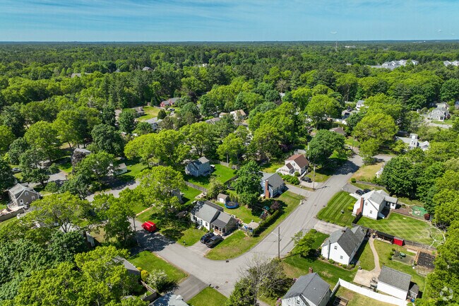 Lush vegetation surrounds the quiet streets of Norwell.