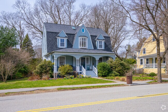 Newton Center residents take pride in taking care of their leafy lawn space.