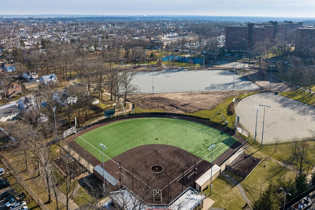 Experience the vibrant atmosphere of Ivy Hill Park through an aerial view of the ball field, highlighting the full range of exciting activities this wonderful park provides.