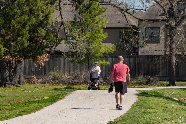 Freed Park features lush greenery and shaded walking paths for tranquil strolls.