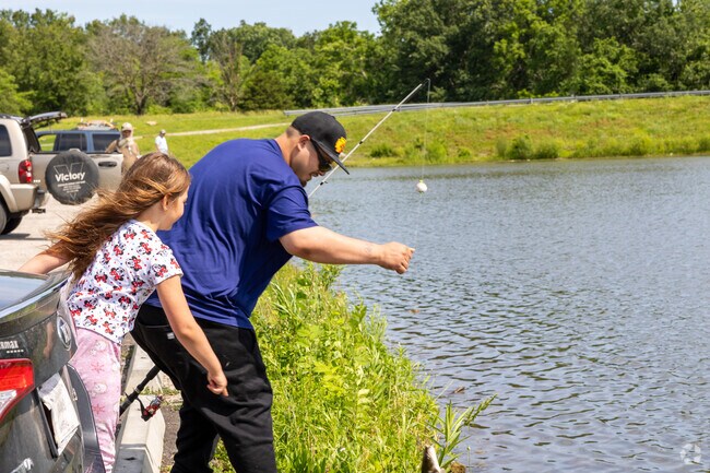Catching a fish with dad is so awesome at Pierson Park Lake.