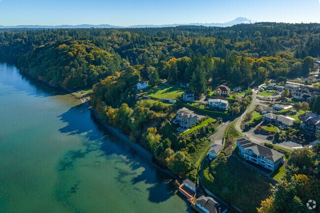 The Dash Point neighborhood is nestled in mature trees and nature.