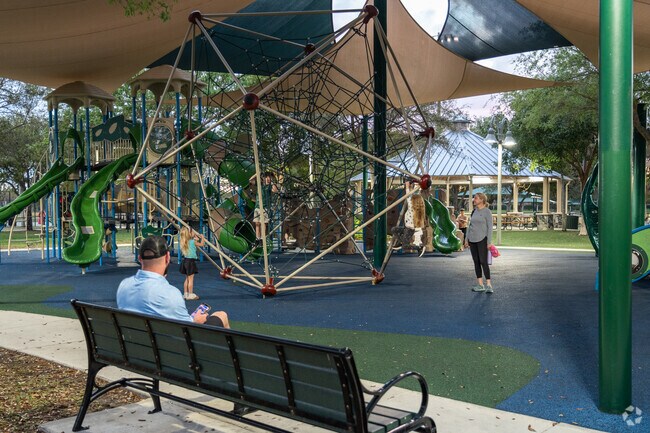 Pine Trails Park offers residents a large playground great for children to burn off energy.