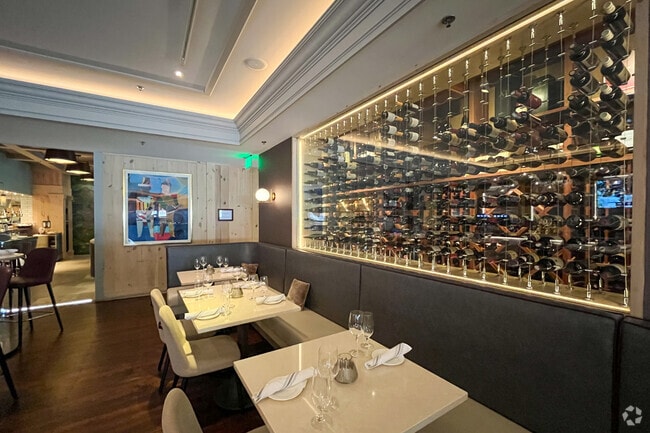 Vyne features a welcoming dining area and a spacious bar room for Middlebury residents to enjoy.